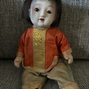Asian-Style Decorative Doll in Orange and Gold Outfit
